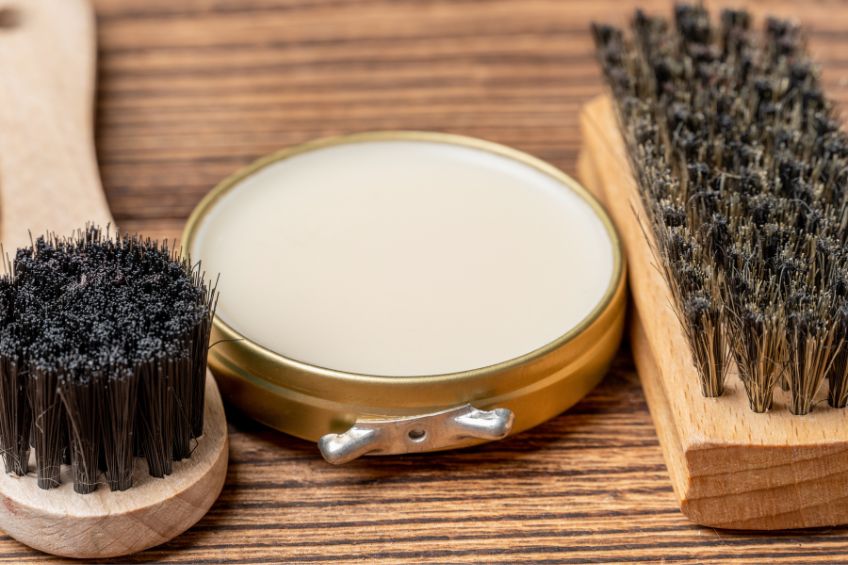 Shoe Wax conditioner by Vitalii Bezverkhii from Getty Images (1) Close up of an open can of shoe shine conditioner