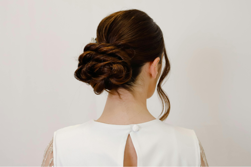 Braided Updp_ by Hairstudio Natascia freda from Pexels Year view of Brunette with beautiful dark brown hair with a formal Updo style