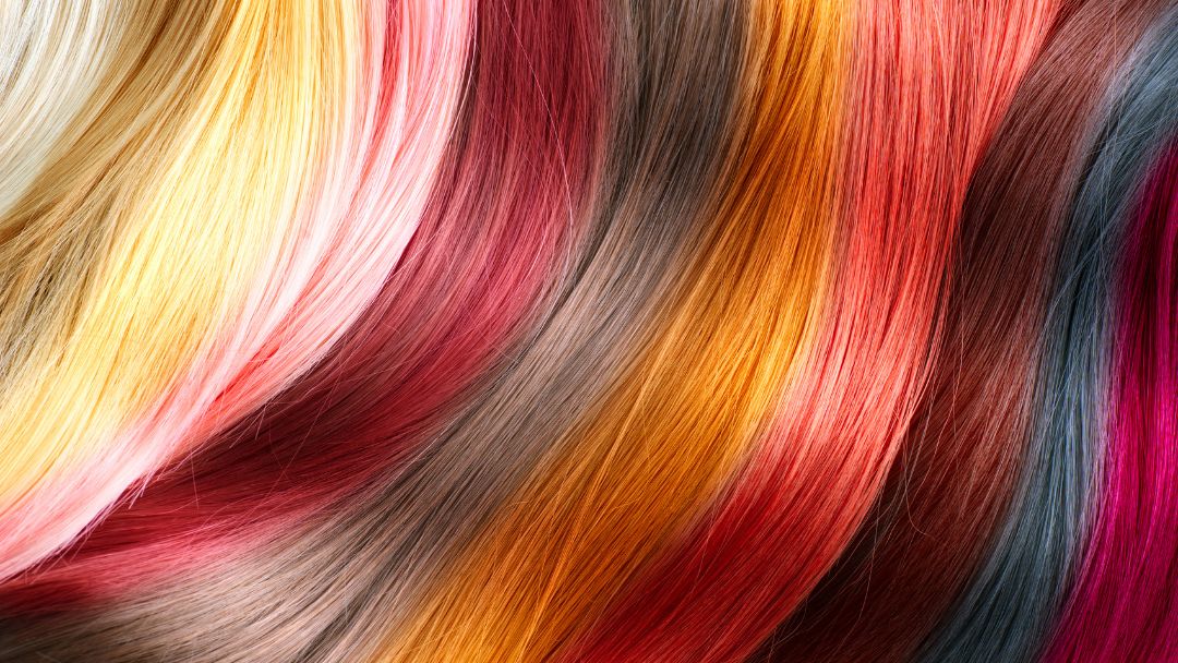 7 Sample bold hair colors; bright blond, medium blonde, pink, reddish-brown, gold, and medium pink