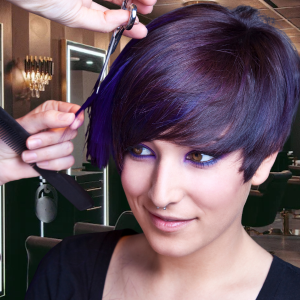 Salon Image of a young women with short black hair getting a pixie cut for her summer hairstyle.